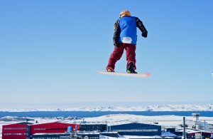 A snowboarder soars at the 2016 Arctic Winter Games. Photo courtesy of AWG2016.